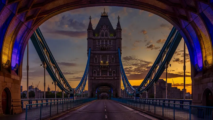 Traveller planning a food journey through England with a guidebook