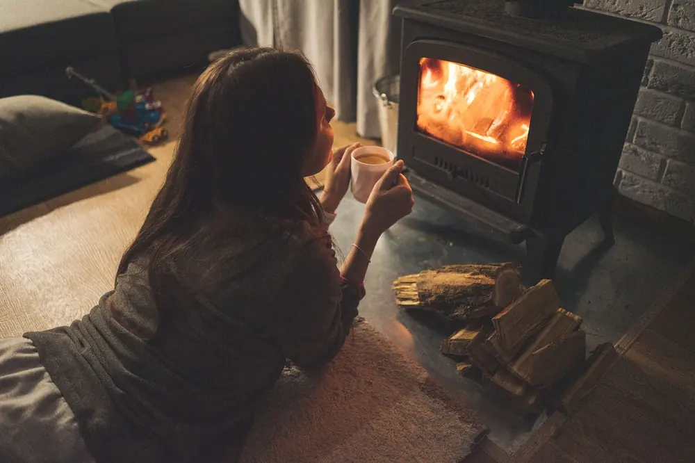 Cosy fireside setting reflecting the atmosphere of The Three Chimneys dining room