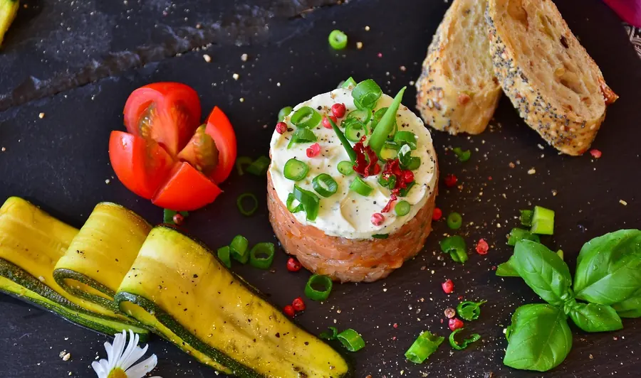 Fresh Scottish salmon representing the Hebridean seafood on the Land and Sea menu