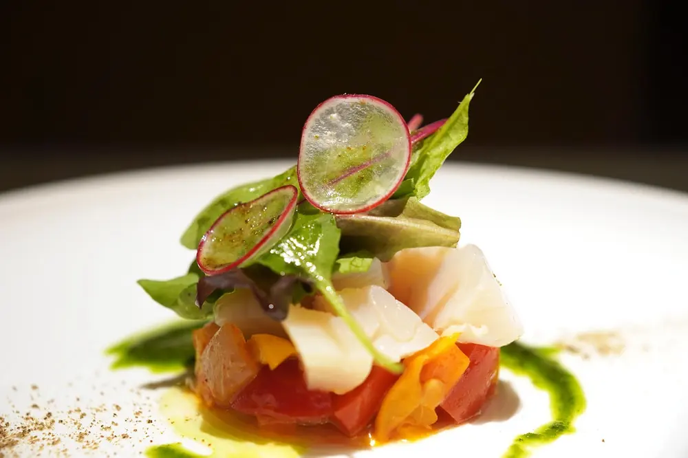 Scallop course in the style of the Orkney scallop served at The Clove Club