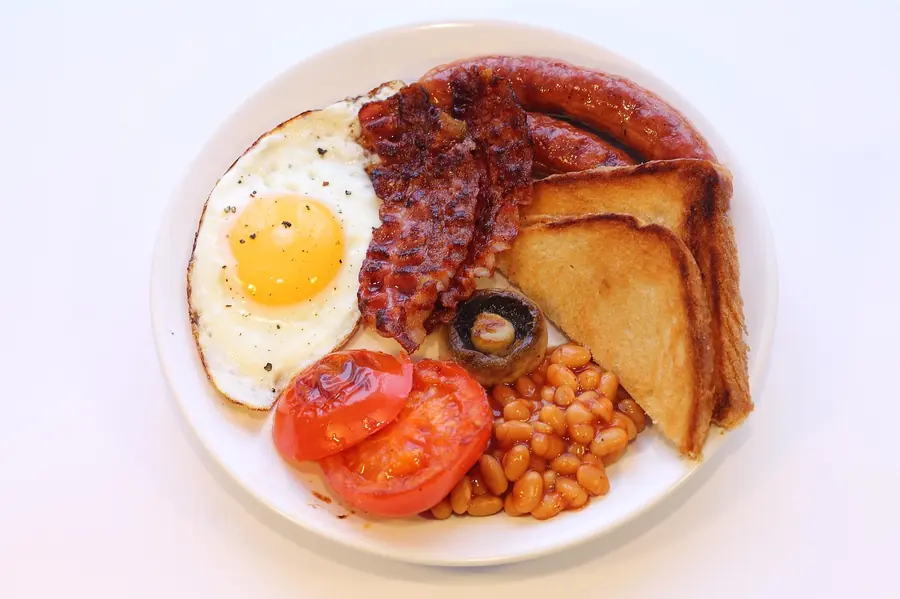 Full English breakfast with eggs, bacon and beans
