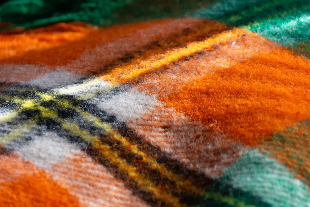 Woven Scottish wool echoing the tartan detailing in The Kitchin dining room