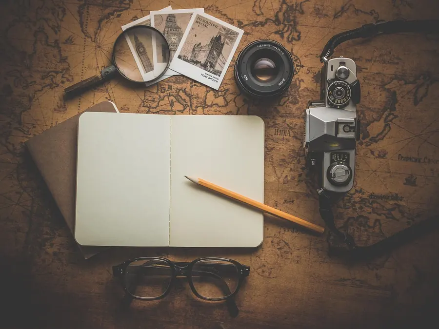 Route map and notebook used to plan a multi-stop food trip in the United Kingdom