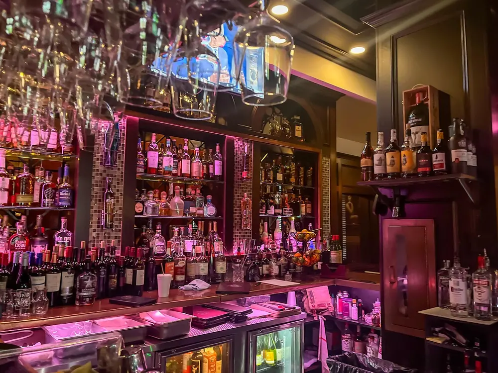 Low-lit bar and restaurant interior reflecting the atmosphere at Ynyshir